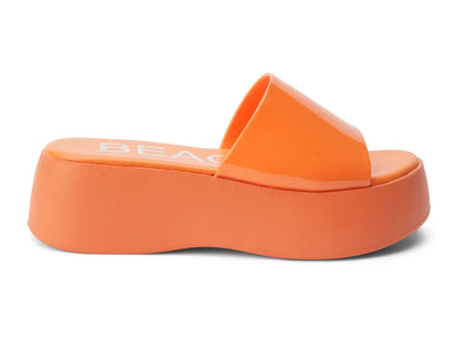 Solar Platform Sandal - Orange  Vegan, single-band jelly platform sandal. Synthetic upper