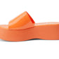 Solar Platform Sandal - Orange  Vegan, single-band jelly platform sandal. Synthetic upper