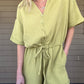 Button Front Romper V neckline Side pockets Drawstring waistband