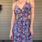Ruffle Cut Out Midi Dress V neckline with ruffle trim Ruffle bodice Side cutout accents Cutout back Adjustable cami straps