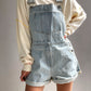 Oversized woven denim overall shorts with cuffs